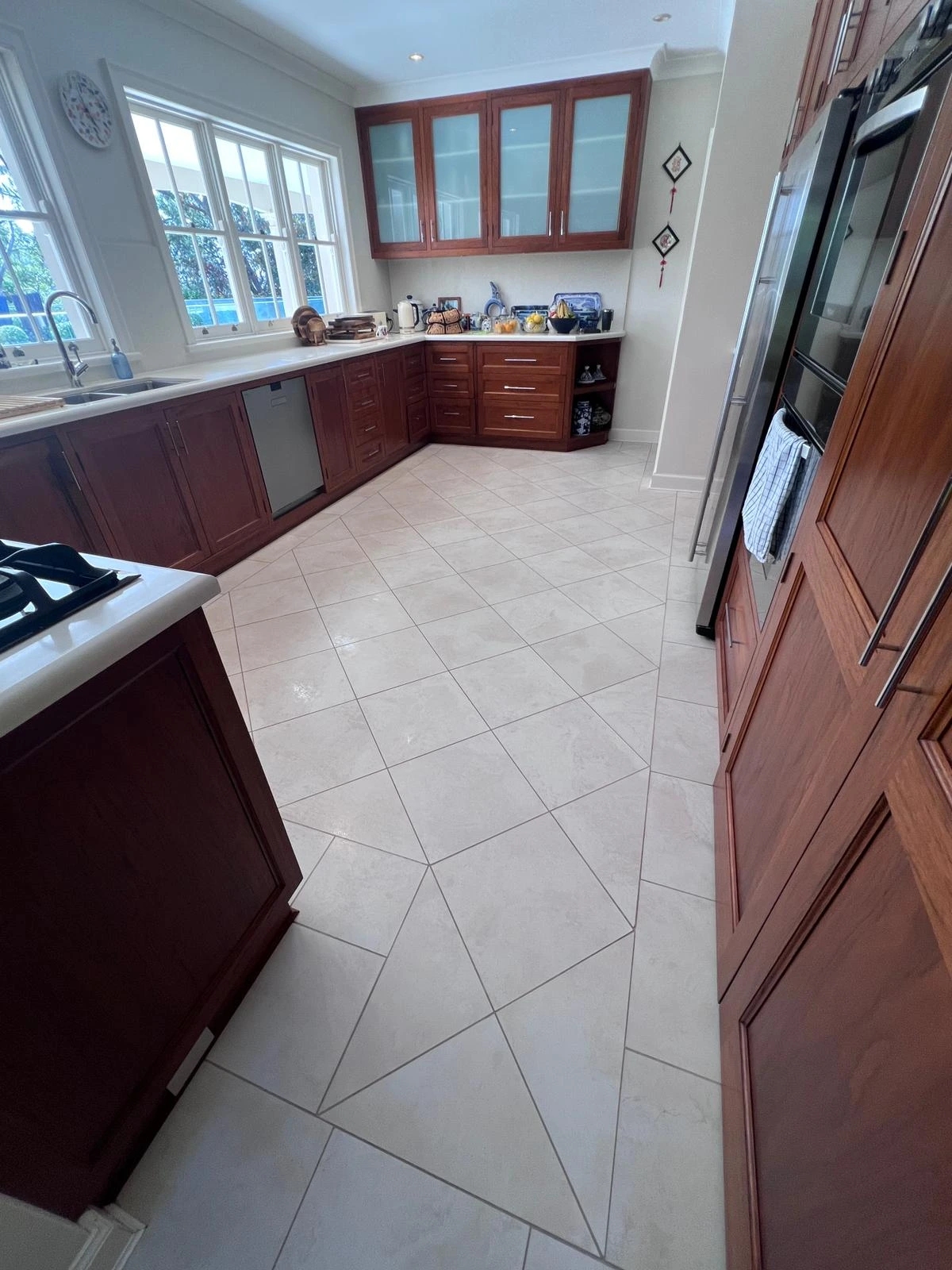 Professional house cleaning — Sydney kitchen and hallway